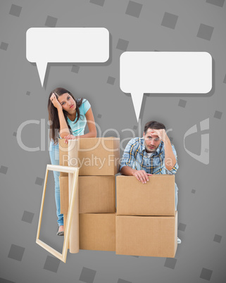 Composite image of stressed young couple with moving boxes