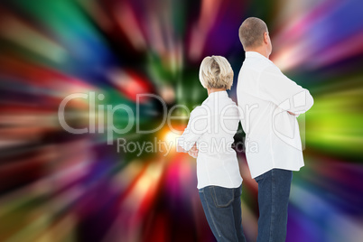 Composite image of upset couple not talking to each other after