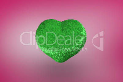 Deep green heart on pink background