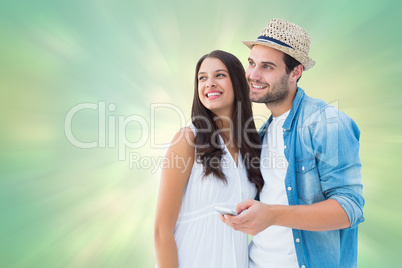 Composite image of happy hipster couple smiling together