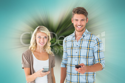 Composite image of attractive couple using their smartphones