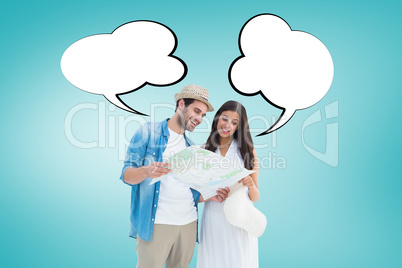 Composite image of happy hipster couple looking at map