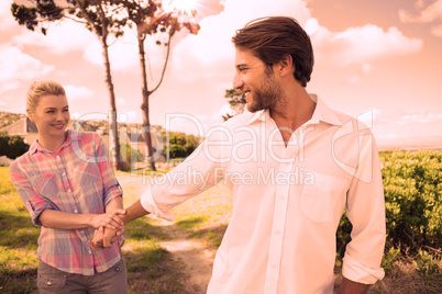 Smiling couple standing outside together in their garden