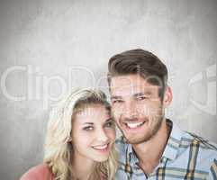 Composite image of attractive young couple smiling at camera