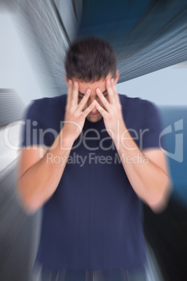 Composite image of man with headache