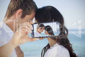 Couple taking selfie on smartphone