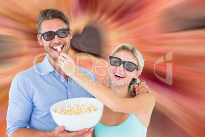 Composite image of happy young couple wearing 3d glasses eating