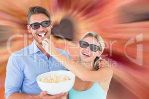 Composite image of happy young couple wearing 3d glasses eating