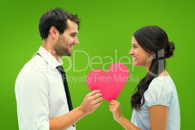 Composite image of pretty brunette giving boyfriend her heart Composite image of pretty brunette giving boyfriend her heart