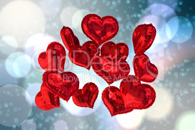 Composite image of heart balloons