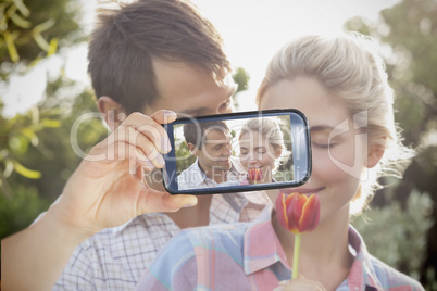 Couple taking selfie on smartphone