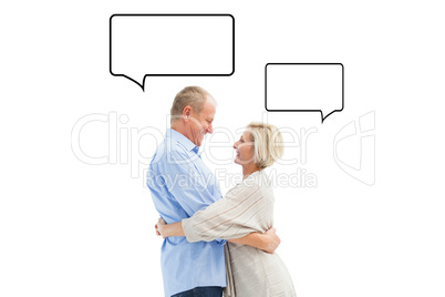 Composite image of happy mature couple hugging and smiling