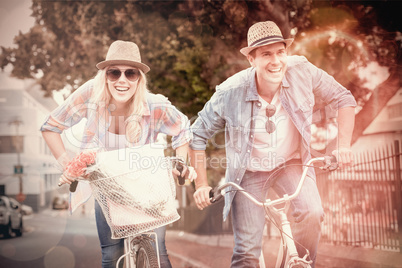 Hip young couple going for a bike ride