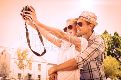 Stylish young couple taking a selfie