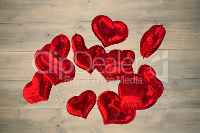 Composite image of heart balloons