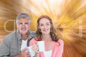 Composite image of casual couple having coffee together
