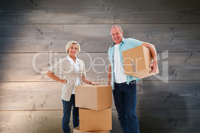 Composite image of older couple smiling at camera with moving bo