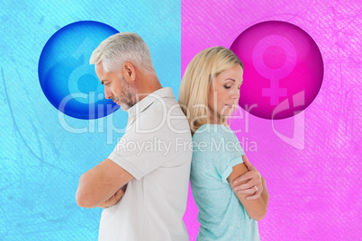 Composite image of unhappy couple not speaking to each other