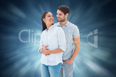 Composite image of cute couple embracing and smiling at each oth