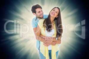 Composite image of happy casual couple smiling and hugging