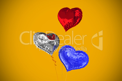 Composite image of heart balloons