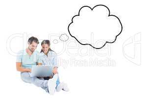 Composite image of cute couple sitting using the laptop