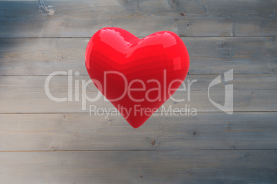 Bright red heart shaped balloon