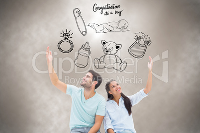 Composite image of cute couple sitting with arms raised