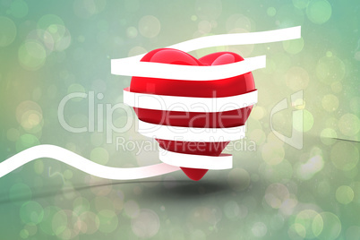 Composite image of love heart wrapped in ribbon