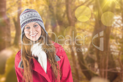 Composite image of pretty redhead in warm clothing