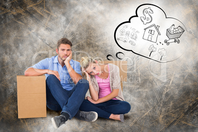 Composite image of unhappy young couple sitting beside moving bo