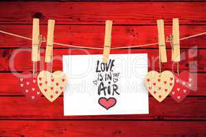 Composite image of love is in the air