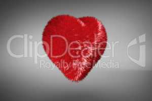 Red heart on a grey background