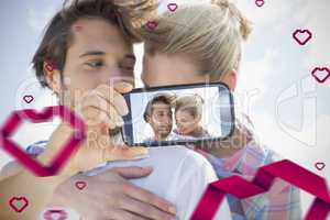 Couple taking Valentines selfie