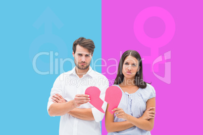 Composite image of upset couple holding two halves of broken hea