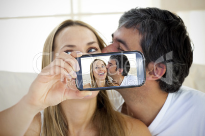 Couple taking selfie on smartphone