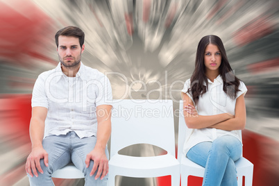 Composite image of angry couple not talking after argument