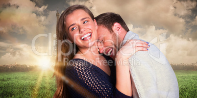 Composite image of close up of happy young couple