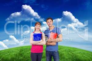 Composite image of two students both with notepads