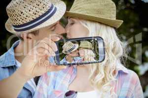 Couple taking selfie on smartphone