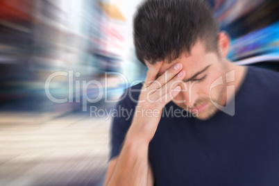 Composite image of man with headache