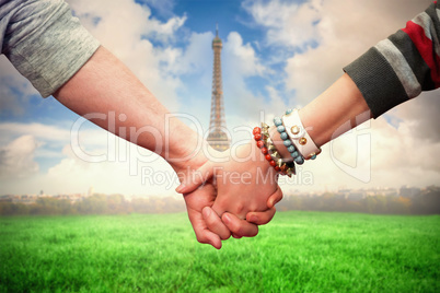 Composite image of students holding hands