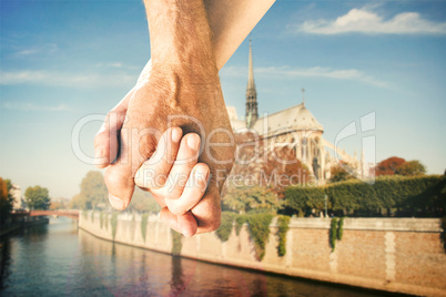 Composite image of happy senior couple holding hands