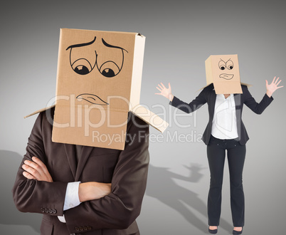 Composite image of businesswoman with box over head