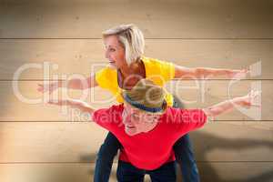 Composite image of mature couple joking about together