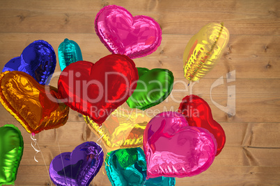 Composite image of heart balloons