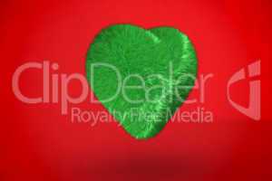 Deep green heart on red background