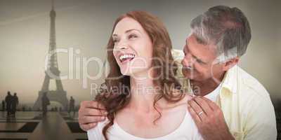 Composite image of casual couple laughing together