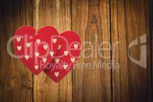 Composite image of cute heart decorations