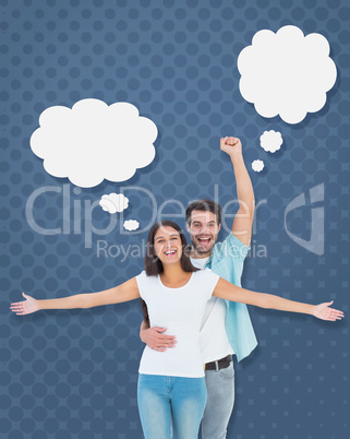 Composite image of happy casual couple cheering together